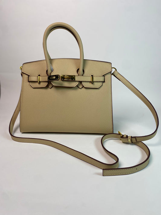 Front view of Birkin 30 cm handbag on white background.