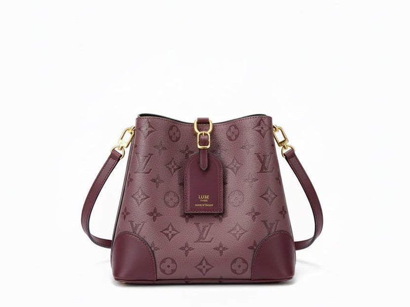 Louis Vuitton vintage fringe bucket bag