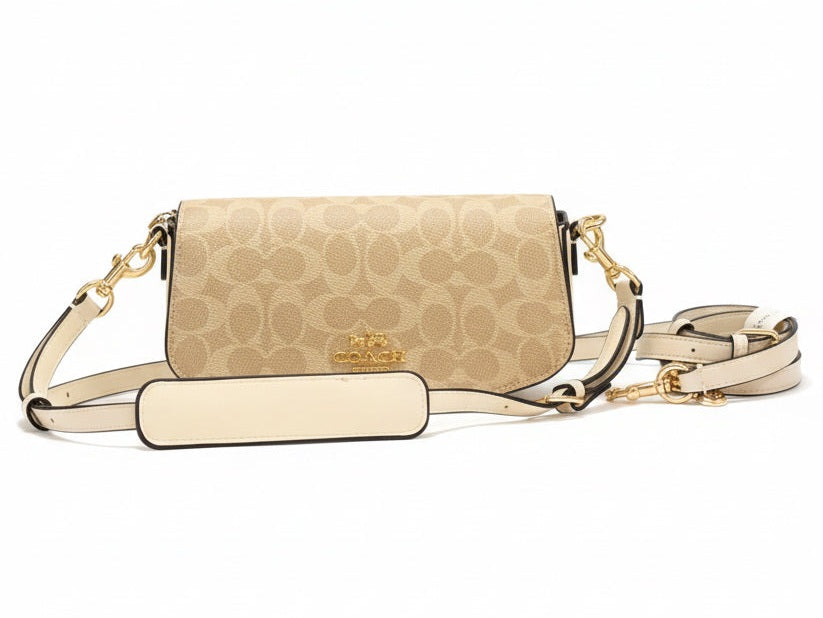 Front view of Coach bag on white background.
