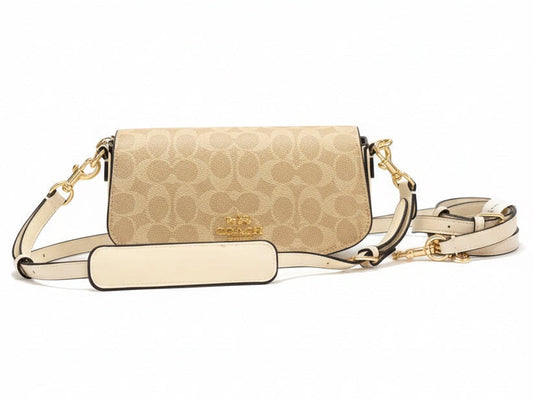 Front view of Coach bag on white background.